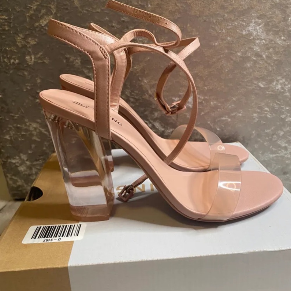 NEW springs clear heels